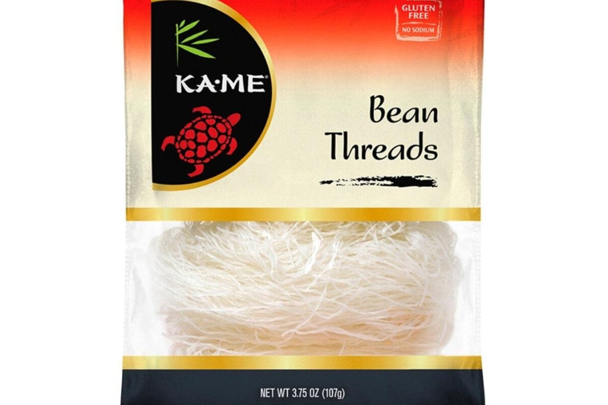 Image shows bean thread noodles before cooked in a package.