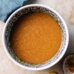 Recipe image shows creamy miso dressing with ginger in a bowl.