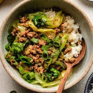 A recipe image shows miso sauce ground pork stir fry with crisp iceberg lettuce served over rice.