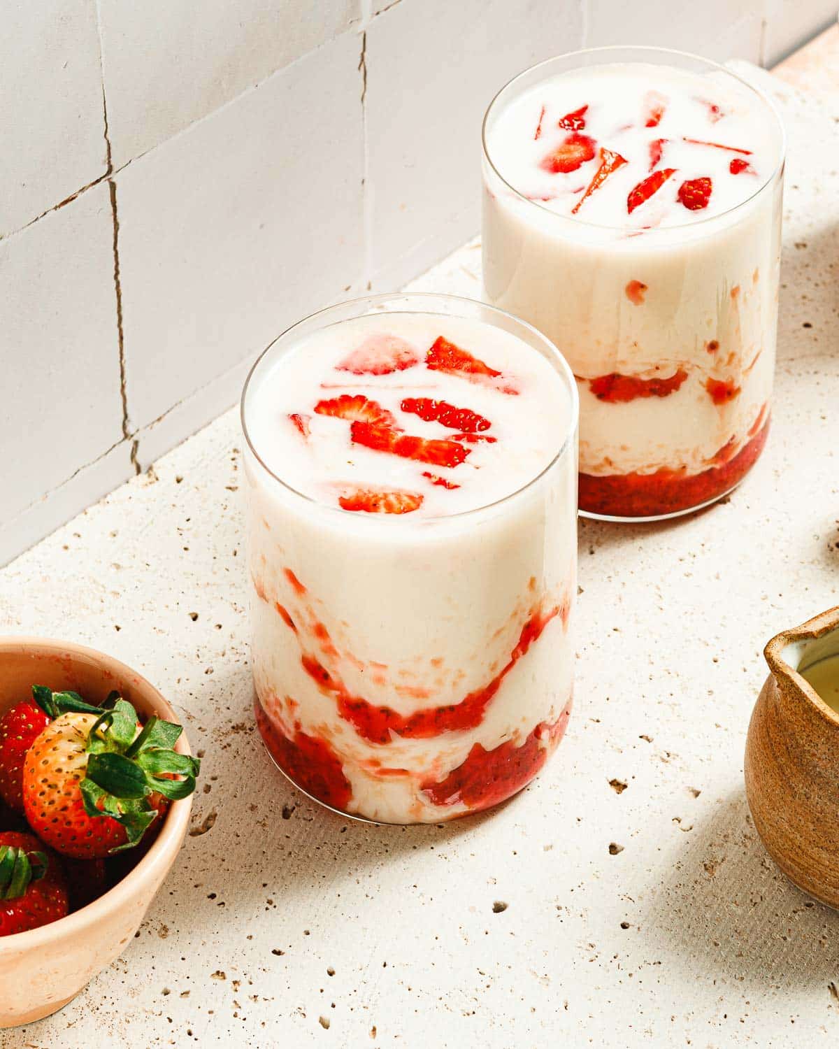 A side close shot image shows 2 glasses of refreshing Korean strawberrymilk ready to serve.