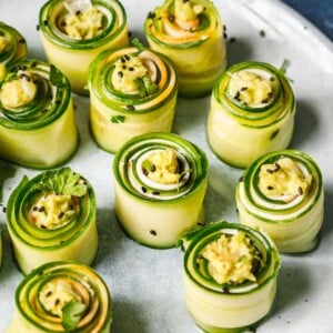 Recipe image shows cucumber rolls with avocado and turkey deli meat filling.