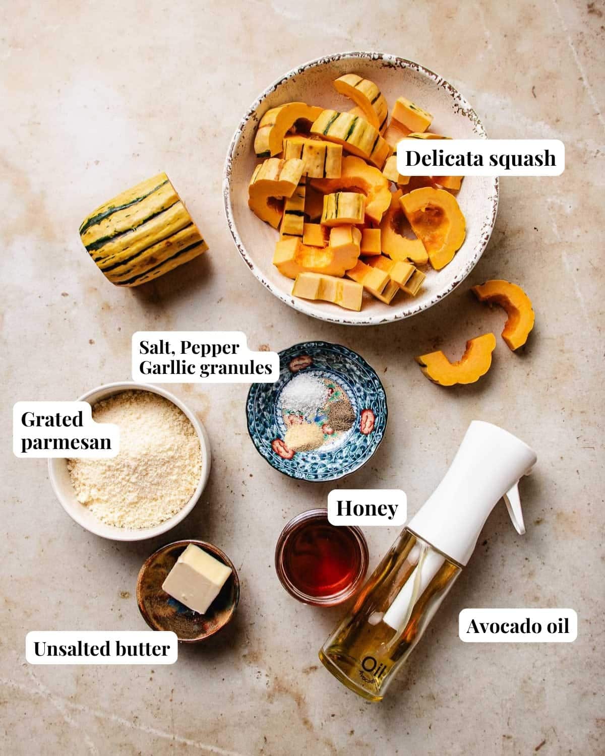 Photo shows ingredients used to air fry and season delicata squash.