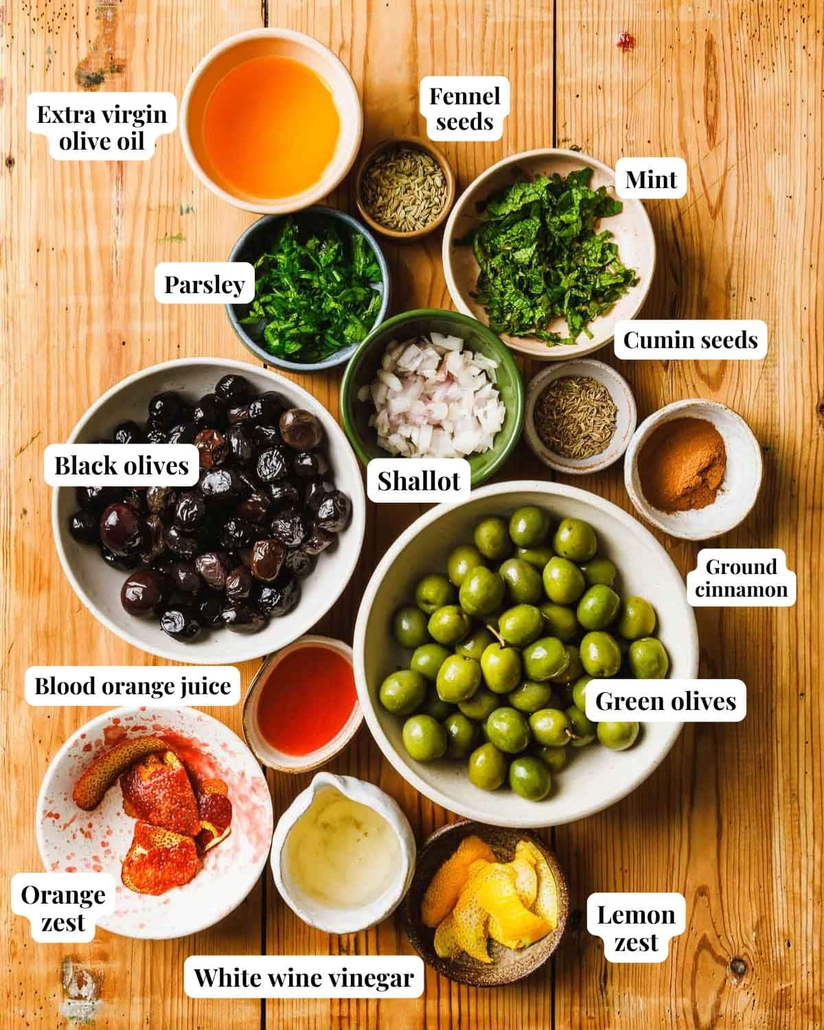 Image shows ingredients needed to marinate olives.