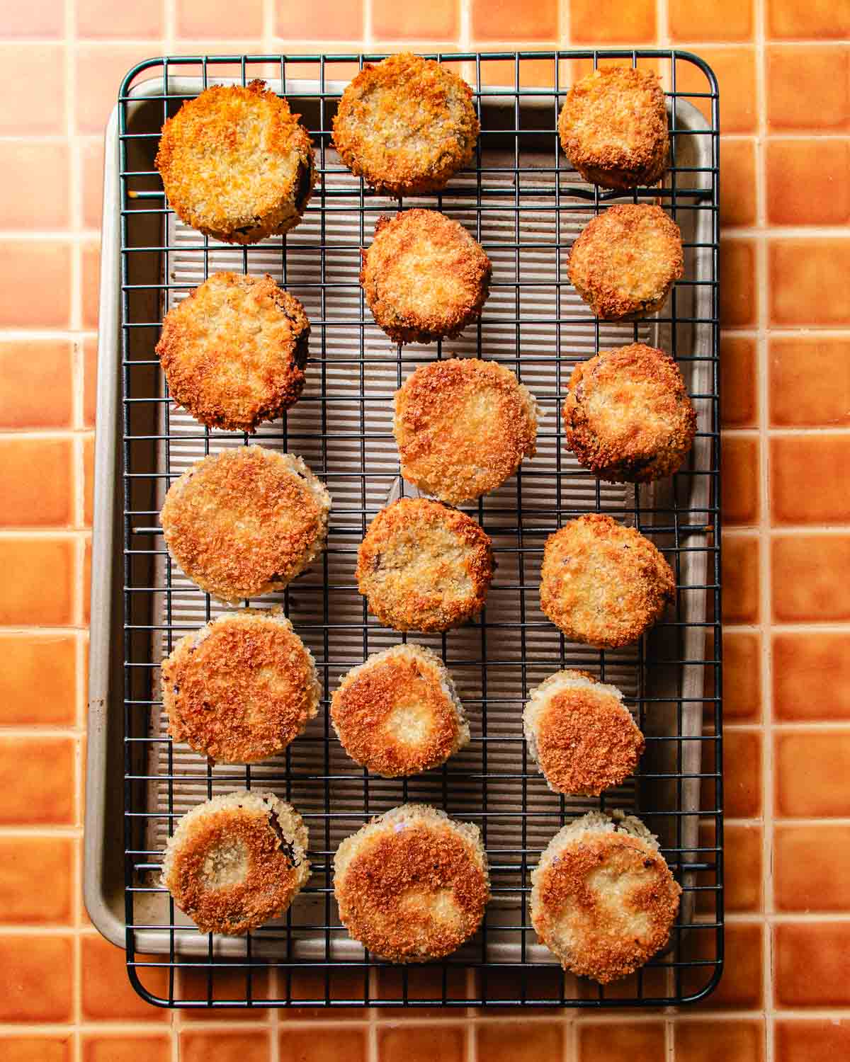 Photo shows breaded eggplants baked to crispy.