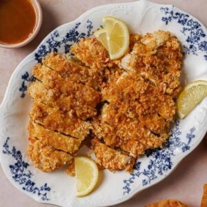Recipe image for Crispy Chinese lemon chicken with Chinese lemon sauce on the side.