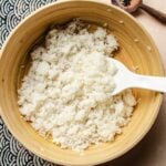 Recipe image shows perfectly cooked rice cooker sushi rice seasoned with sushi vinegar.