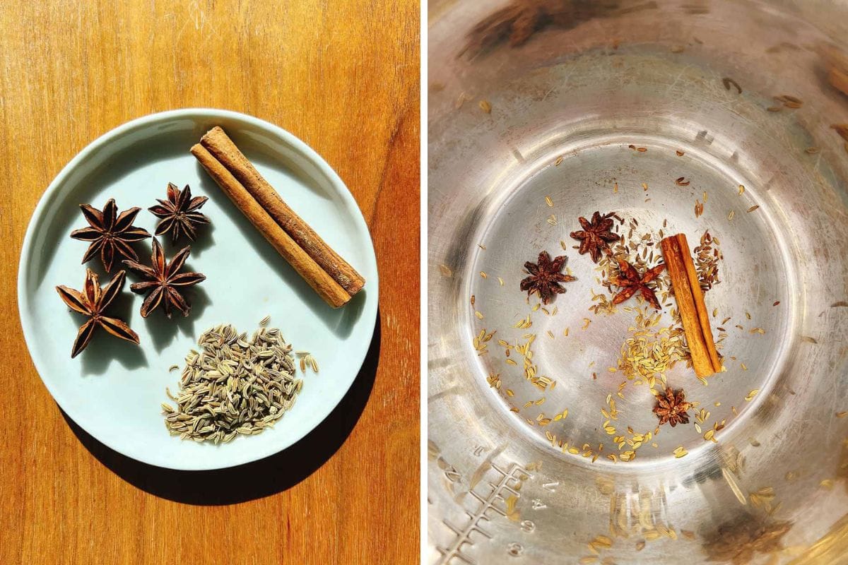 A white plate with star anise, cumin seeds, and a cinnamon stick on a wooden table; the same spices are ready to flavor turkey pho bone broth in the bottom of a stainless steel pot.