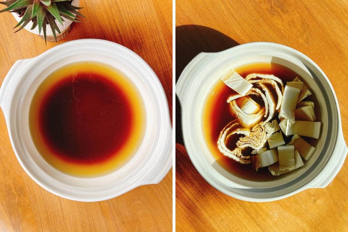 Diptych image: Left, a white pot filled with dark brown chicken meatball hot pot broth on a wooden surface. Right, the same pot with broth, now containing pieces of napa cabbage stems. A potted succulent is partially visible in the corner.