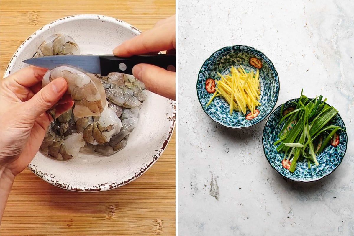 A hand slices on the back of a raw shrimp on a plate with more shrimp beside it, perfect for making rice paper shrimp chips. Nearby, two small bowls hold sliced ginger, julienned green onions, and red chili slices on a light surface.